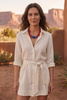 Brunette model wearing a shirt dress and the Alhambra Necklace in a Southwestern setting