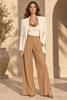 Full-length editorial model look with the Reddy Necklace