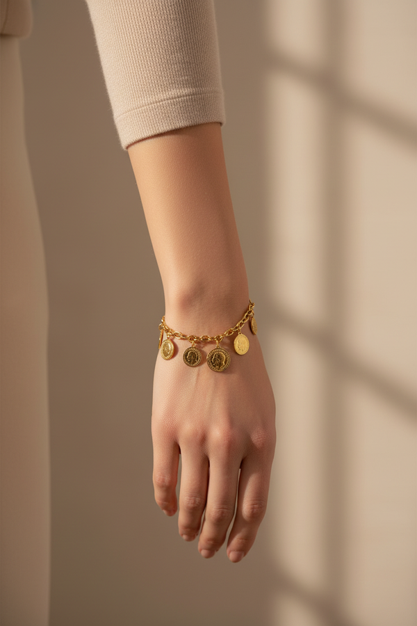 Model wearing one single-strand bracelet with hand pointing down